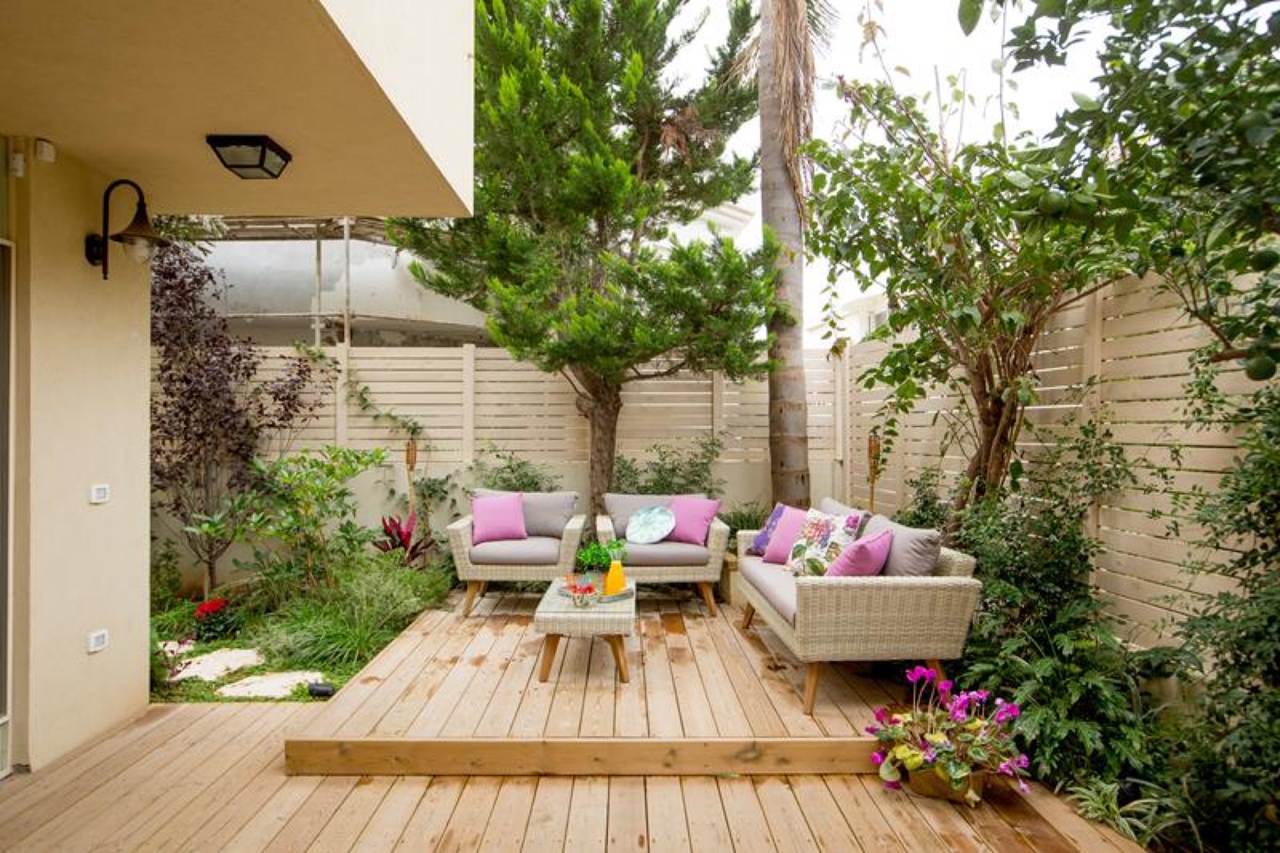 Manitou Springs backyard with cedar deck and slat privacy fence
