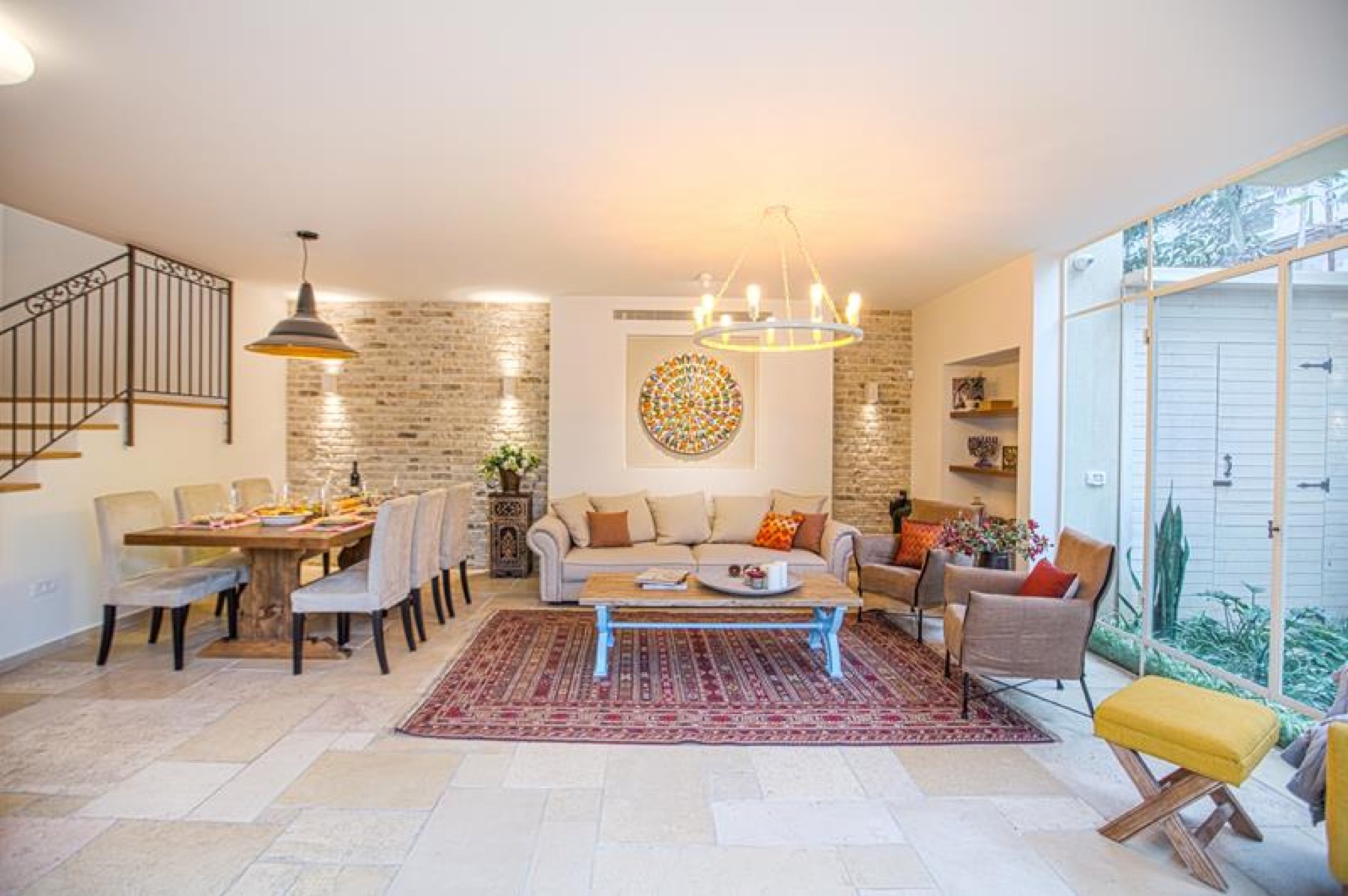 Remodeled living room with exposed brick walls